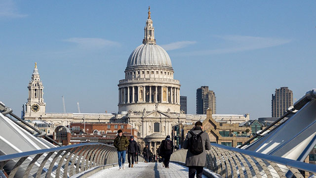 St Paul's Cathedral in the snow © Shutterstock / Photos.London. Image courtesy of Shutterstock / Photos.London. St Paul's Cathedral and the Millennium Bridge in the snow on a sunny day.
