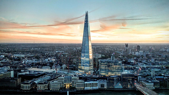 London and the Shard at dusk as the sun sets.