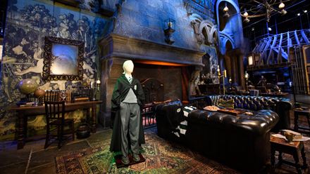 Draco Malfoy costume in the Slytherin common room. Credit: Warner Bros. Studio Tour London – The Making of Harry Potter. Image courtesy of Golden Tours.