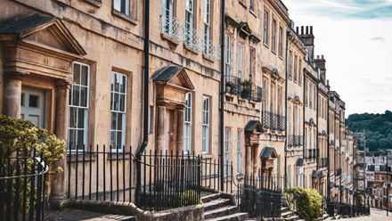 Admire the beautiful historic homes, often featured in period movies in, the city of Bath. © Unsplash/Liv Cashman