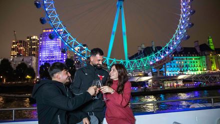 Enjoy a drink aboard a river Thames evening cruise. Image courtesy of City Cruises.