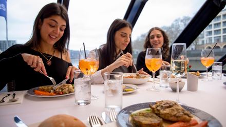 Tuck into a delicious meal as you soak up the London sights from the river with City Cruises. Image courtesy of City Cruises.