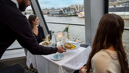 Unwind on the river Thames as you enjoy a lunch cruise in London. Image courtesy of City Cruises.