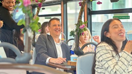 Tuck into a unique Indian-themed afternoon tea on board a high chai afternoon tea bus tour. Image courtesy of Golden Tours.