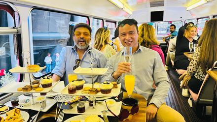 Enjoy delicious treats on the musical afternoon tea bus tour of London. Image courtesy of Golden Tours.