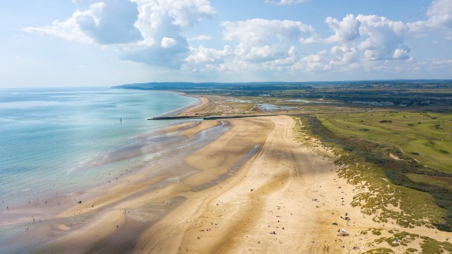 Aerial view of Camber Sands beach on a clear day.
