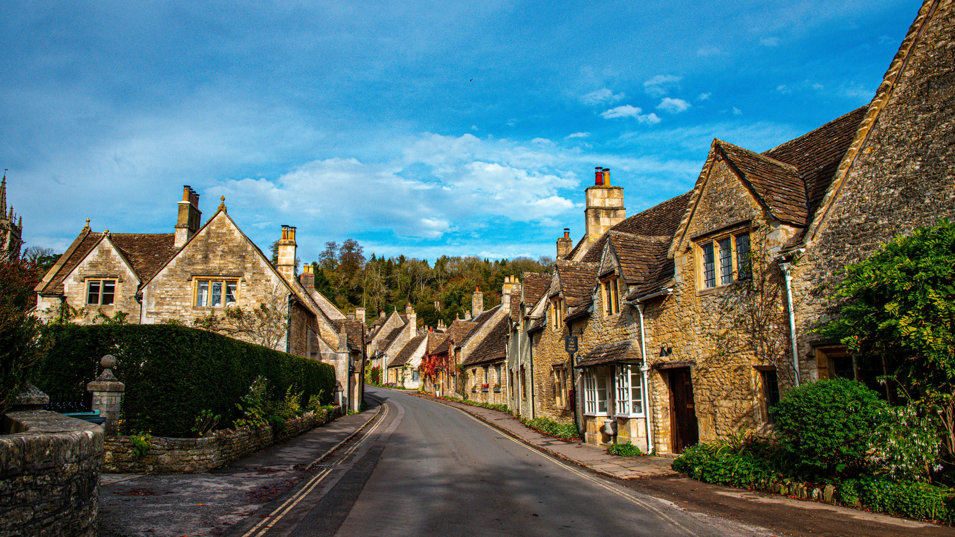 Cottages line the main street of Castle Combe in the Cotswolds.