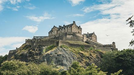 Visit Edinburgh Castle on a day trip to Edinburgh. Image courtesy of Unsplash, credit: Jorg Angeli