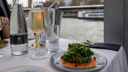 Take to the Thames on a London dinner cruise. Image courtesy of Golden Tours.