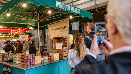 Pick up delicious from a global mix of food at Borough Market. Image courtesy of London & Partners.