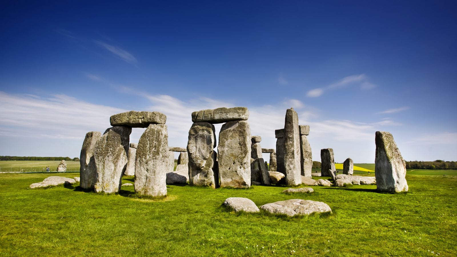 Stonehenge on a bright day with blue sky