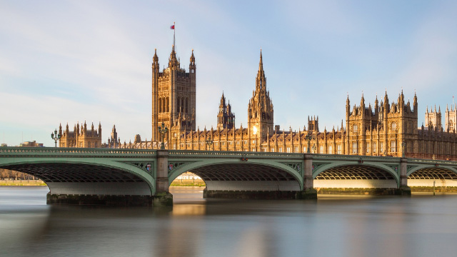 Riverside facing Westminster Bridge and the Houses of Parliament on a sunny day
