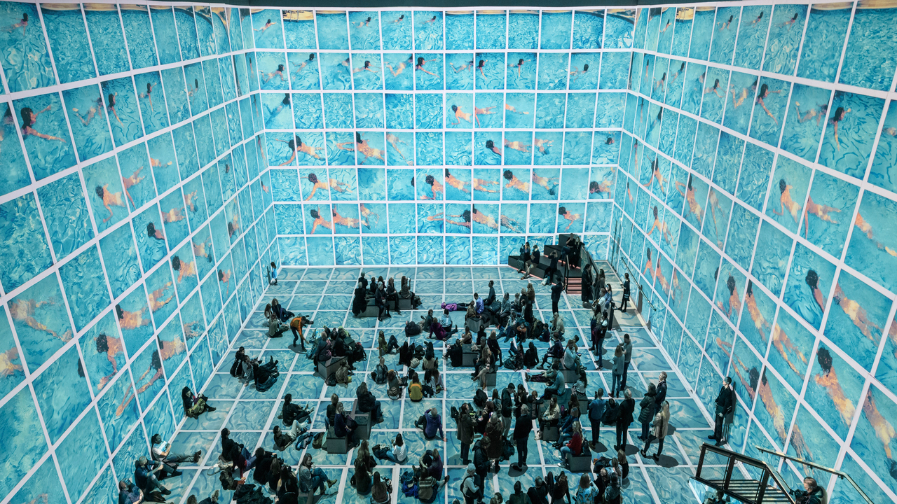 David Hockney Bigger & Closer (not smaller & further away), image courtesy of Lightroom. Photo by Justin Sutcliffe. Multiple people standing in exhibition space of David Hockney Bigger & Closer (not smaller & further away)
