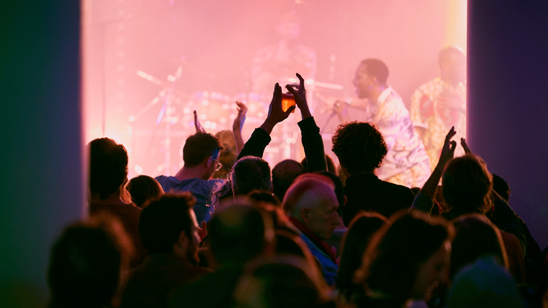 Let the rhythm sweep you off your feet at EFG London Jazz Festival. Credit: Emile Holba. Image courtesy of Emile Holba. The Scorpions play onstage with crowd swaying arms in the air in front
