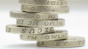 British pound coins in a pile