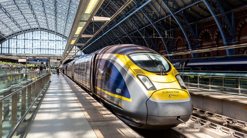 Travel to and from London quickly with the Eurostar. Credit: Shutterstock. Image courtesy of Shutterstock. A photo of a Eurostar train on the platform at St Pancras Station in north London