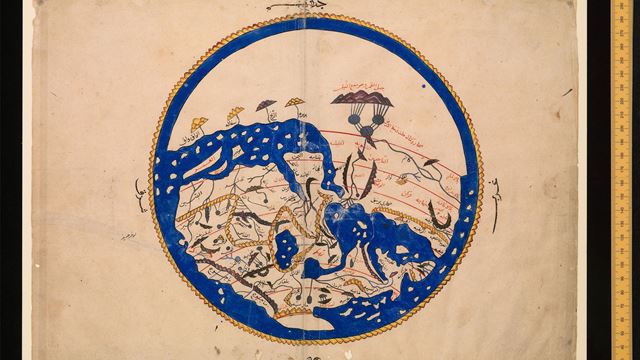 Blue and yellow map of the world drawing on paper.