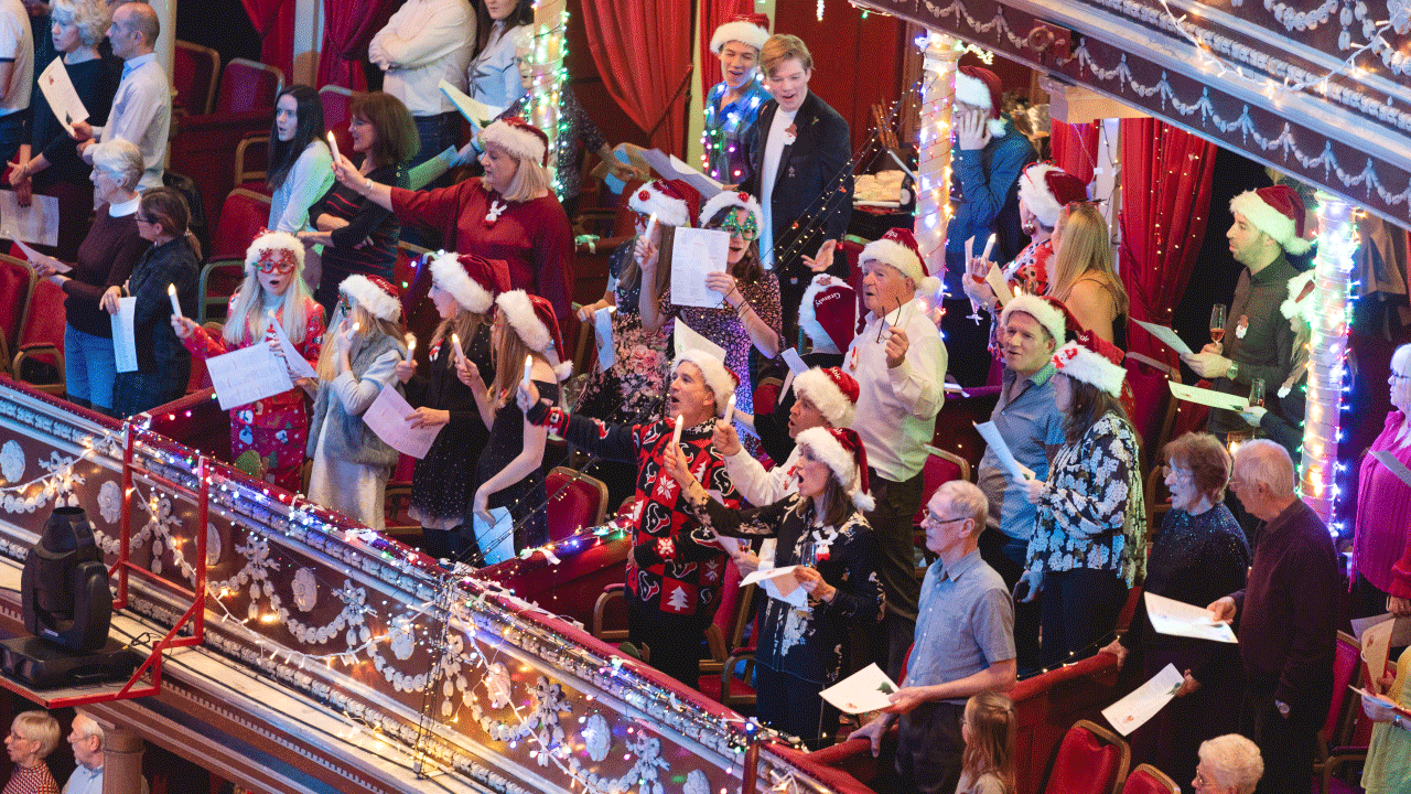 Carols at the Royal Albert Hall. Credit: Andy Paradise/Paradise Photos. Image courtesy of Royal Albert Hall. Choir sings at Royal Albert Hall carol event