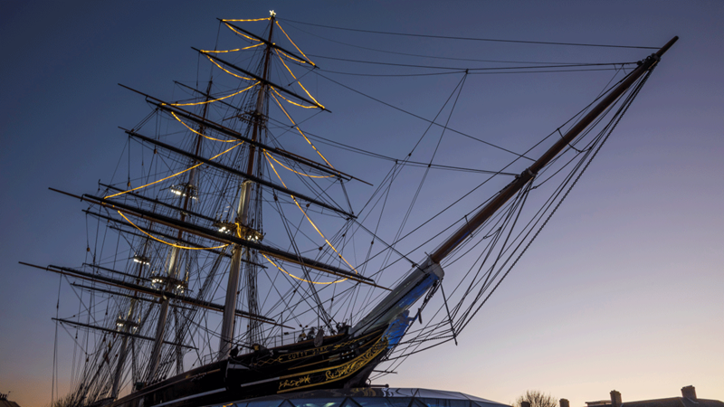 Spot Cutty Sark in Greenwich dressed up for the festive season. Credit: National Maritime Museum, Greenwich, London. Image courtesy of the National Maritime Museum. Lights decorate the rigging of Cutty Sark in the shape of a Christmas tree