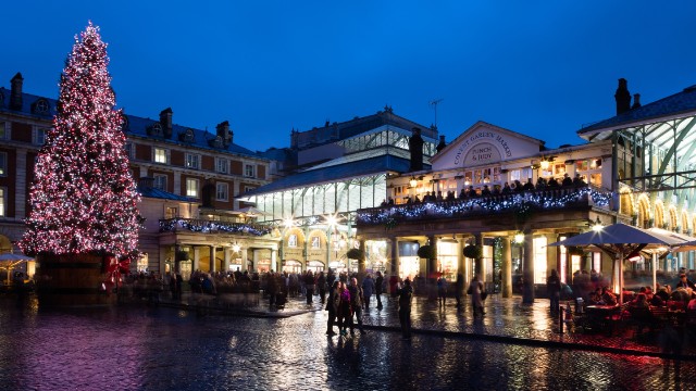 Shop in London's Covent Garden day and night. ©Brendan Bell/Covent Garden. Tall, sparkling Christmas tree outside Covent Garden in the evening