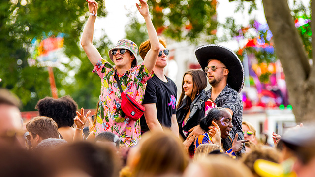 Festival-goers dancing at Cross The Tracks music festival in Brockwell Park, London