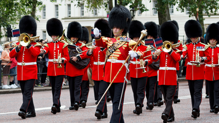 Don't miss the Changing the Guard parade during your visit to London. Credit: Shutterstock. Image courtesy of Shutterstock.