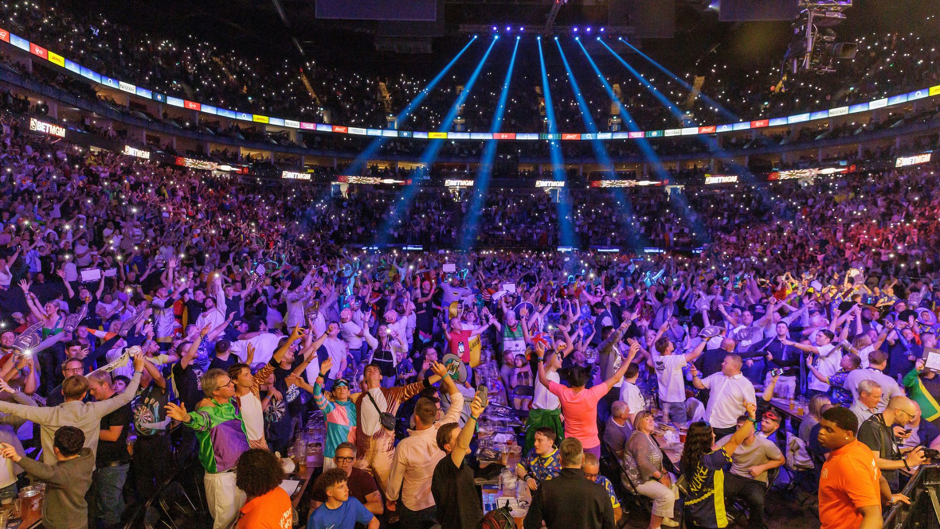 Fans fill up The O2 in London as they watch the world's best dart players take to the stage. Image courtesy of PDC. Photo Credit: Simon O'connor Fans fill up The O2 in London as they watch the world's best dart players take to the stage.
