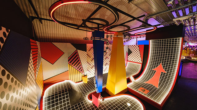 Be mind-blown by visually appealing courses and fun challenges at Birdies. Image courtesy of Birdies. A neon lit, pop art inspired crazy golf obstacle at Birdies