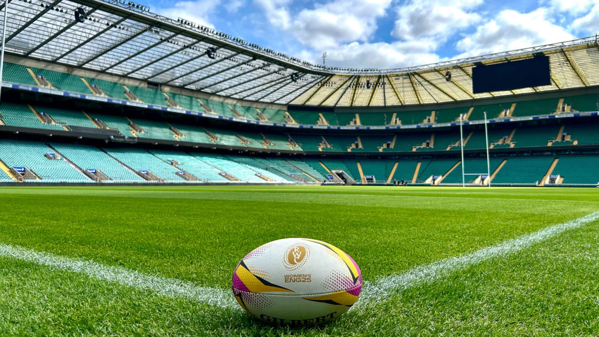 Don't miss the Women's Rugby World Cup 2025. Image courtesy of World Rugby. Rugby ball on the pitch at twickenham stadium.