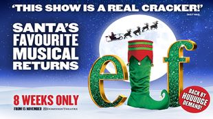 ELF The Musical official poster. A snowy landscape with Santa and his reindeers are flying over with the full moon on the background.