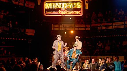 Explore the streets of Manhattan and follow the unlikely love stories of Guys and Dolls currently at the Bridge Theatre. Image courtesy of Premier Entertainment/ photo credit Manuel Harlan.