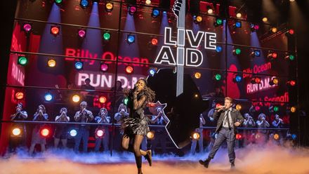 See the stage production of the iconic Live Aid concert with the London musical Just For One Day at the Shaftesbury Theatre. Image courtesy of London Theatre Direct.