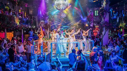 Take to the dance floor in true Dancing Queen style at the Mamma Mia! The Party, where guests gather to dance to ABBA's greatest hits after the show. Image courtesy of ABout Grace PR/ photo credit: Marc Brenner.