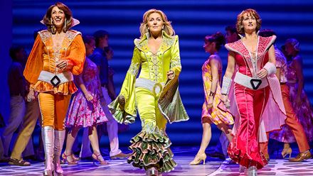 Disco tunes and glittery costumes are the order of the day in the musical Mamma Mia , currently playing at the Novello Theatre. Image courtesy of Amanda Malpass/ photo credit: Brinkhoff & Mögenburg.