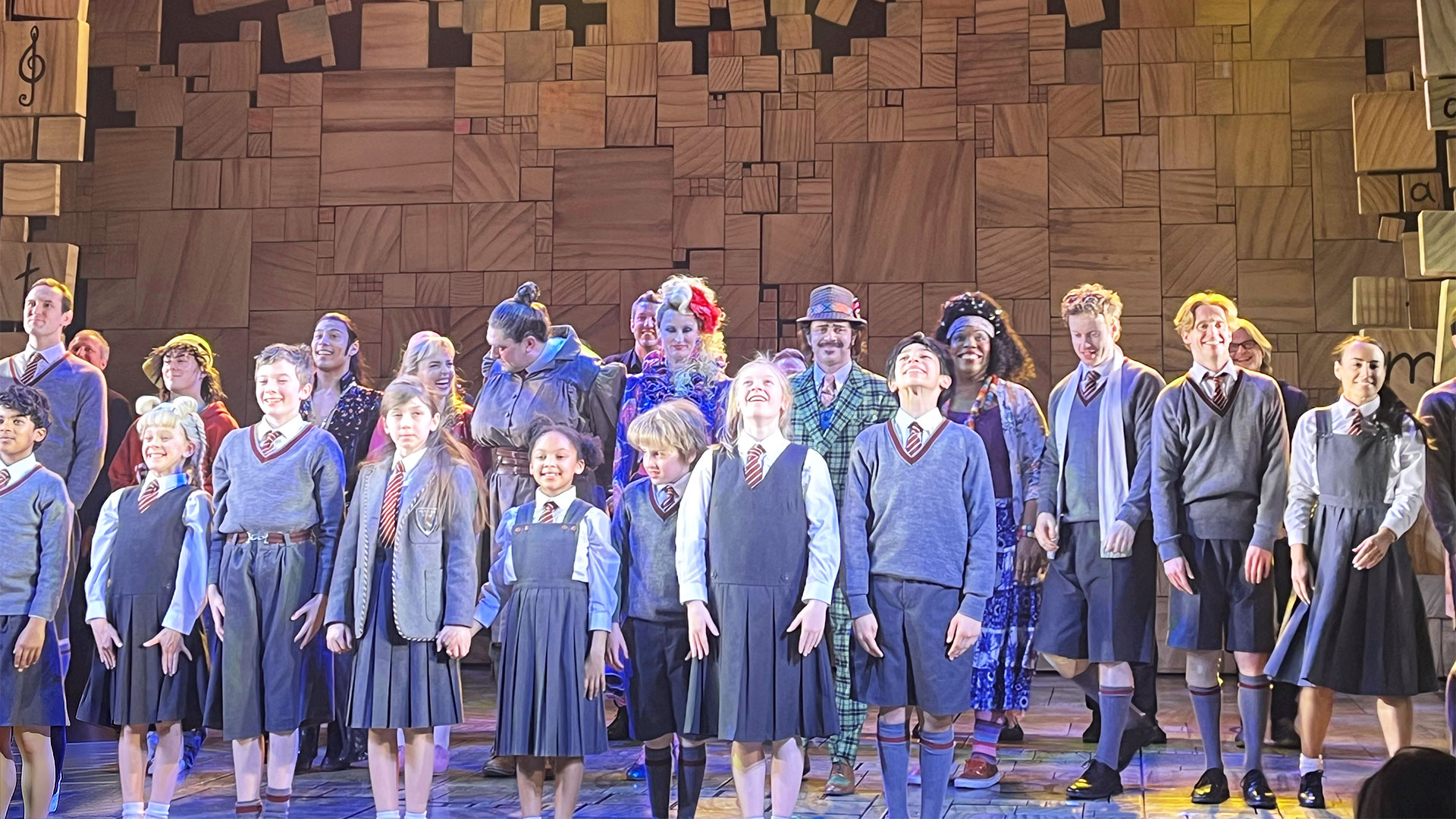 Cheer on the cast of Matilda the Musical as they bring the story of Roald Dahl to life in London's West End. © Carole Rocton The cast of Matilda the Musical, with the children at the front in their school uniforms, take to the stage to the cheers and applause of the audience.