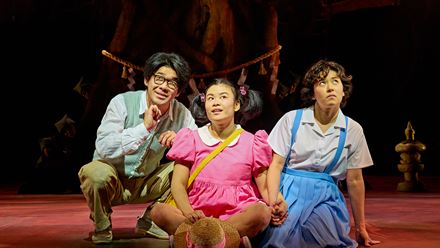 Follow sisters Mei and Satsuki as they discover the spirits of the forest in My Neighbor Totoro, an enchanting play at the Gillian Lynne Theatre. Photo credit: Manuel Harlan (2022 Production)