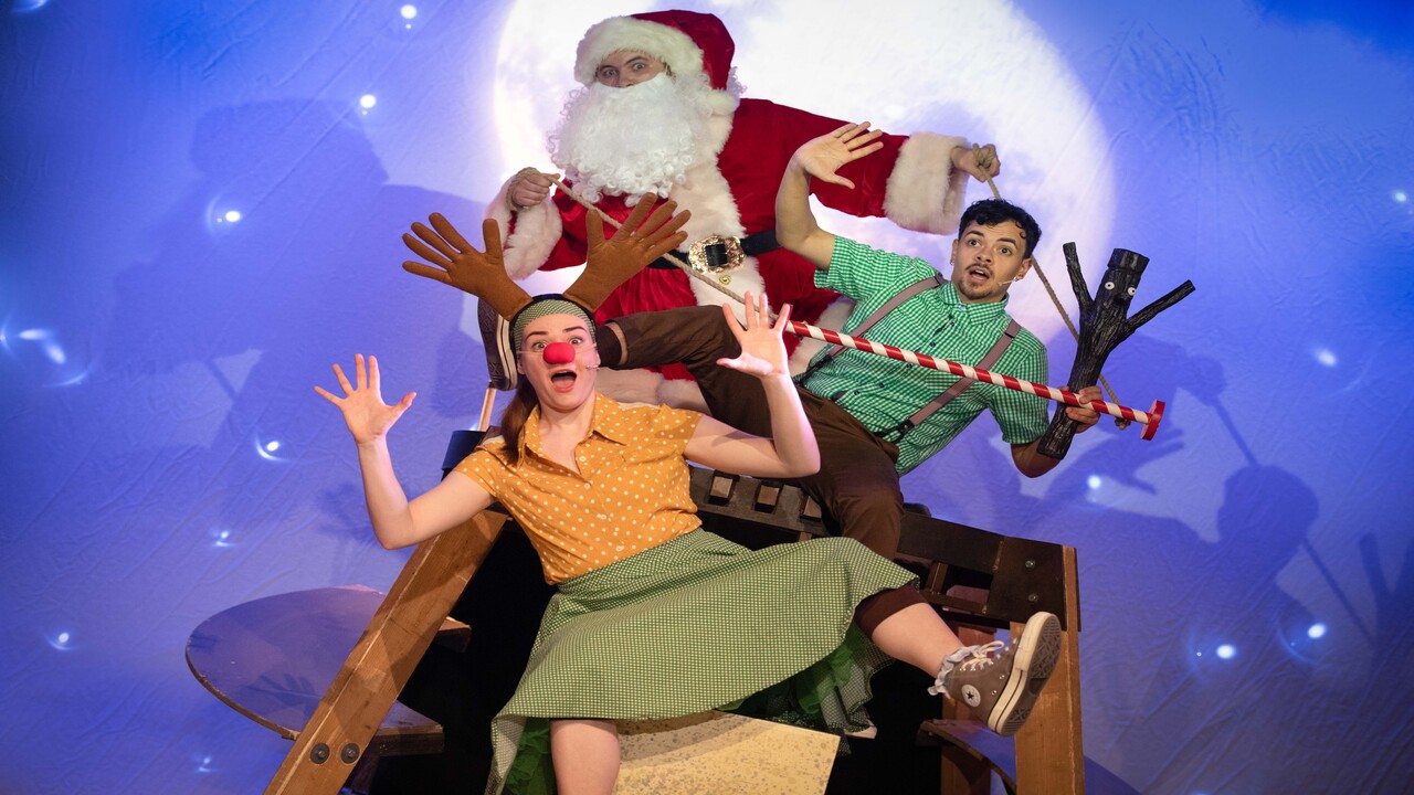 See a show packed with humour this Christmas with Stick Man at the Leicester Square Theatre. Image courtesy of Mark Senior PR. Cast of stick man dressed in Christmas outfits with props, including Santa Claus figure.
