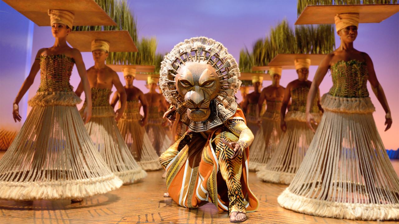 Take a trip to the theatre and the see the award winning Lion King, a favourite with families in London. copyright: Deen Van Meer. Image courtesy of Disney The Lion King. The character Mufasa in a lion costume takes centre stage in The Lion King.