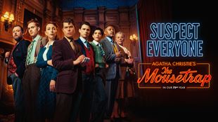 The cast of The Mousetrap, a play by Agatha Christie, look at the camera daringly with Sgt Trotter at the front writting on a notepad.