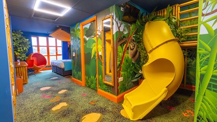 Capri-Sun-themed room with a slide. Image courtesy of Smarts.