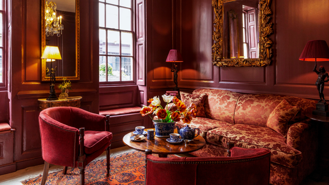 Cosy up in Hazlitt's Georgian-inspired surroundings. Credit: Hazlitt's. Image courtesy of Hazlitt's. Hazlitt's sitting room with sofa and chairs