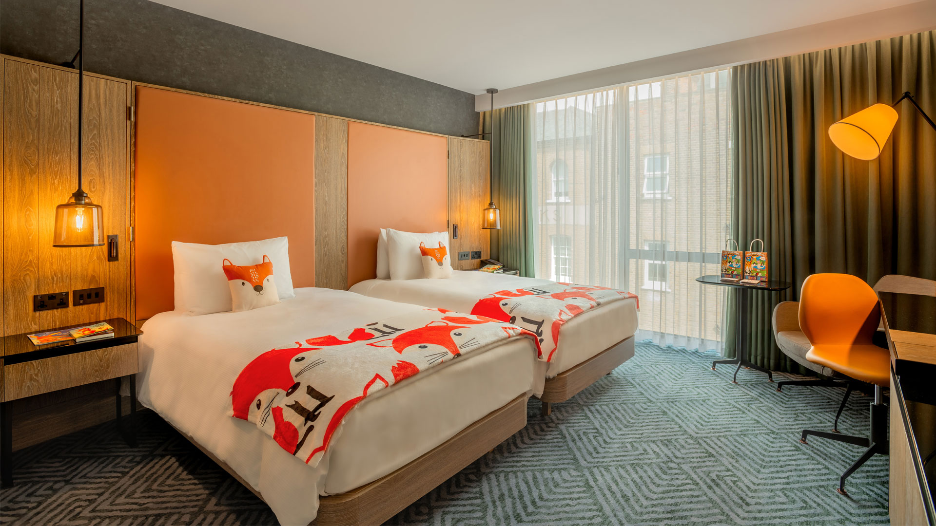 Enjoy spacious family rooms at Hilton London Bankside. Image courtesy of Hilton. Twin beds as part of a family room with fox details at Hilton London Bankside.