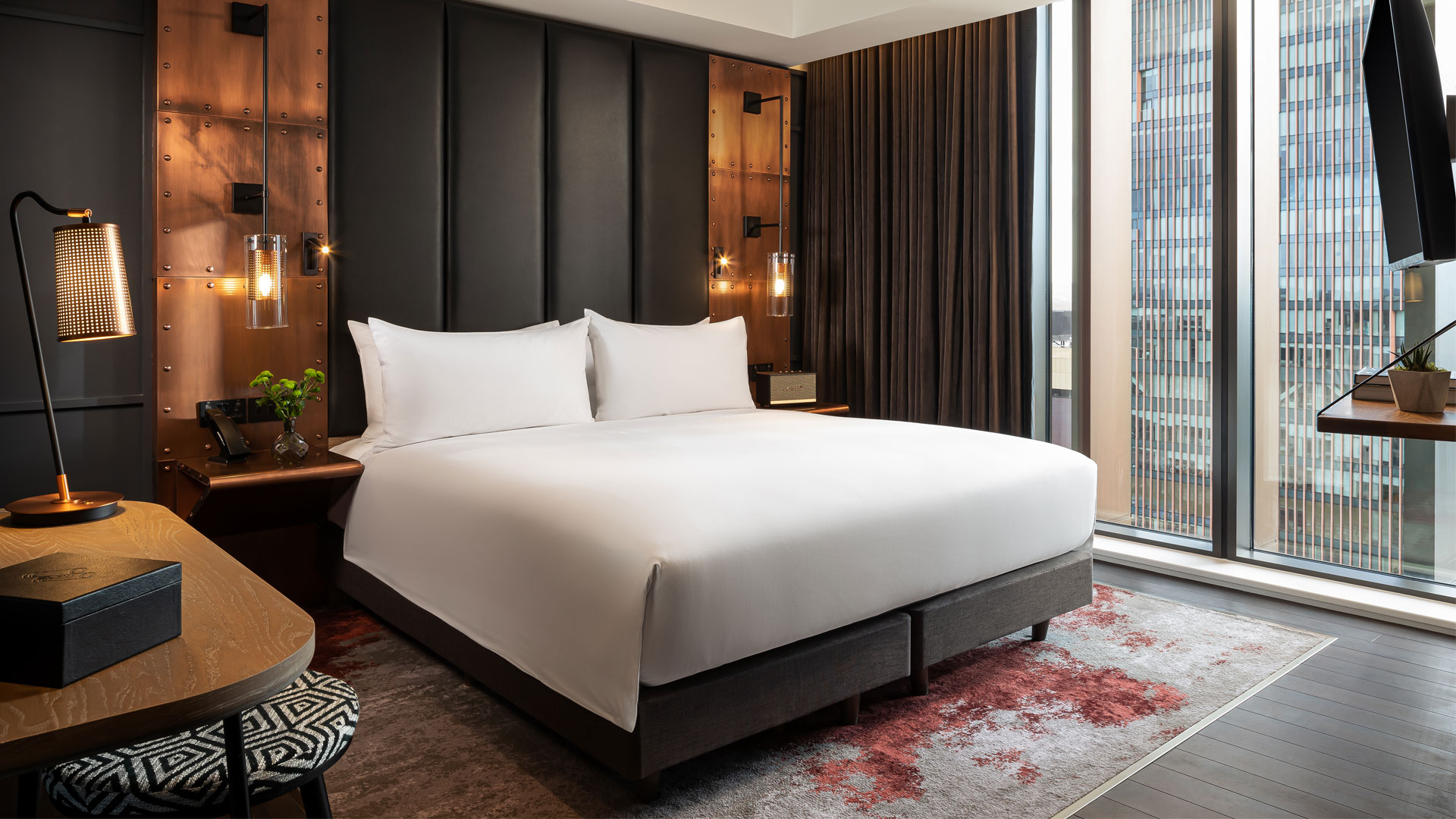 Soak up panoramic views of London from The Gantry. Image courtesy of Hilton. Bedroom as part of a suite at The Gantry London.